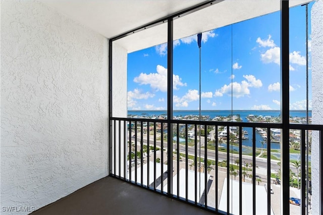 6612 Estero Blvd Unit Ph2, Fort Myers Beach, FL 33931 - unfurnished sunroom featuring a water view
