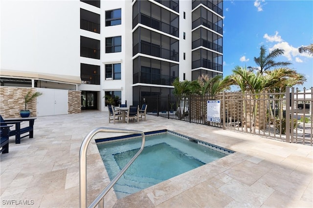 6612 Estero Blvd Unit Ph2, Fort Myers Beach, FL 33931 - view of swimming pool with a community hot tub and a swimming pool