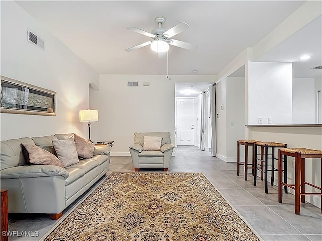 1732 Tarpon Bay Dr S Unit 101, Naples, FL 34119 - living area featuring ceiling fan and baseboards