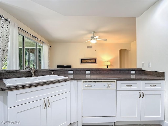 1732 Tarpon Bay Dr S Unit 101, Naples, FL 34119 - kitchen with white dishwasher, a sink, white cabinets, and ceiling fan
