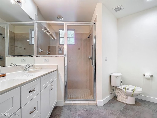 1732 Tarpon Bay Dr S Unit 101, Naples, FL 34119 - full bath with baseboards, toilet, double vanity, a stall shower, and tile patterned floors