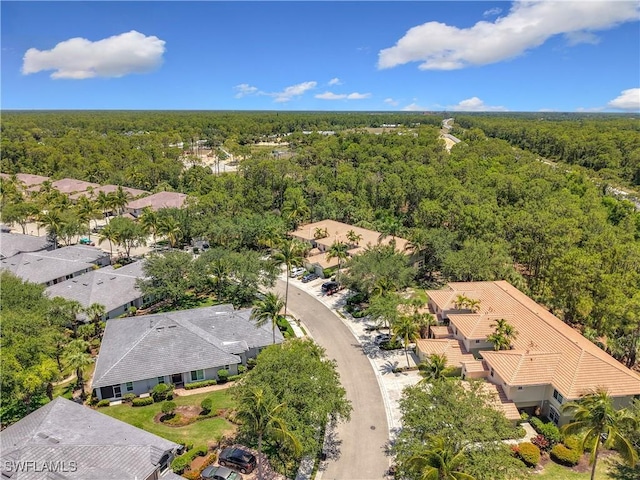 1732 Tarpon Bay Dr S Unit 101, Naples, FL 34119 - aerial view of residential area with a heavily wooded area