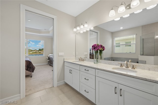 309 Spiaggio Ct, Naples, FL 34114 - full bath featuring baseboards, double vanity, a walk in shower, ensuite bathroom, and crown molding