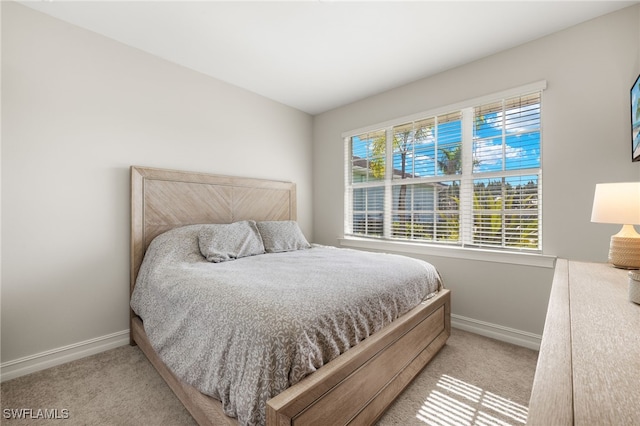 309 Spiaggio Ct, Naples, FL 34114 - carpeted bedroom featuring baseboards
