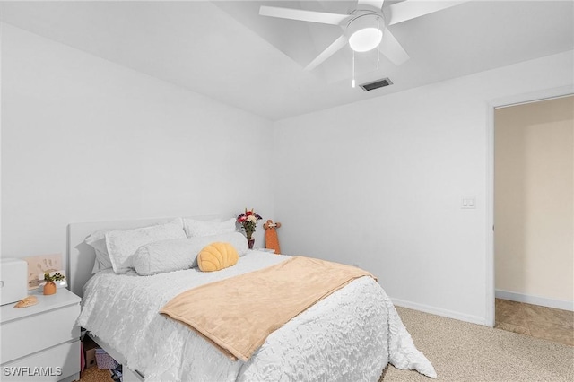7269 Heaven Ln, Fort Myers, FL 33908 - carpeted bedroom with baseboards and ceiling fan