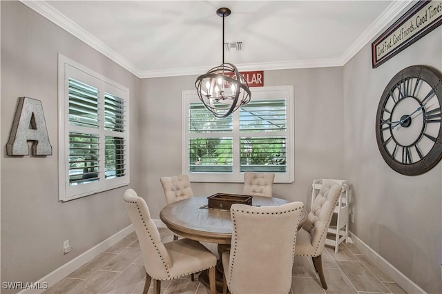 8651 Colony Trace Dr, Fort Myers, FL 33908 - dining area featuring a chandelier, baseboards, light tile patterned floors, and crown molding