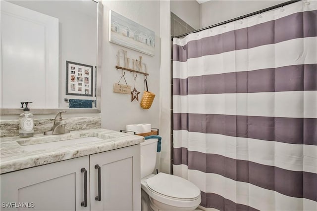 8651 Colony Trace Dr, Fort Myers, FL 33908 - full bath with vanity, toilet, and curtained shower