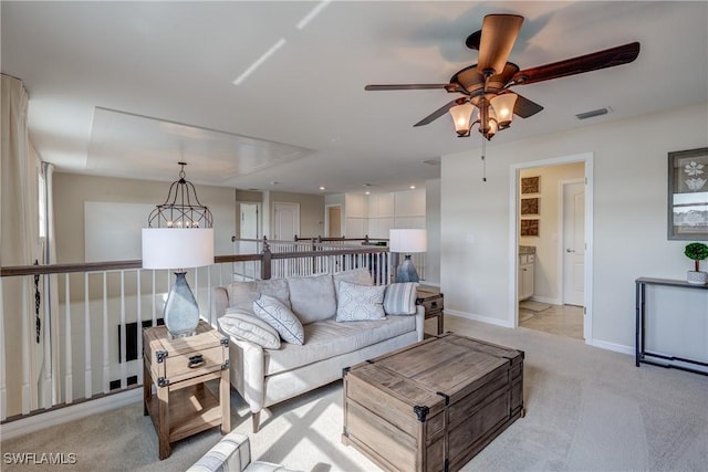 10871 Rose Quartz Ln, North Fort Myers, FL 33917 - living room with ceiling fan, light carpet, and baseboards