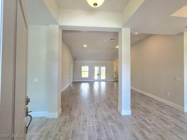 2201 Como St, Port Charlotte, FL 33948 - foyer with light wood-type flooring, baseboards, and recessed lighting