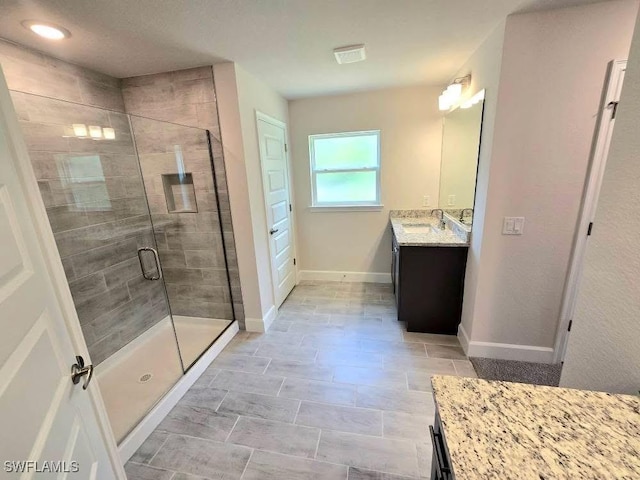 2201 Como St, Port Charlotte, FL 33948 - bathroom featuring vanity, a shower stall, and baseboards