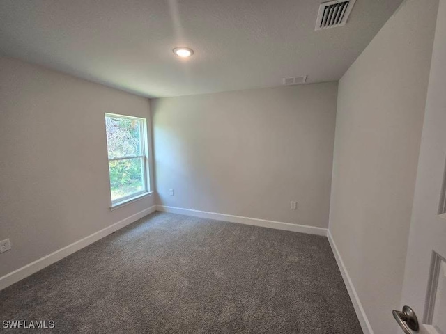 2201 Como St, Port Charlotte, FL 33948 - carpeted empty room with baseboards