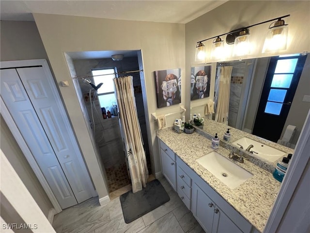 17133 Phlox Dr, Fort Myers, FL 33967 - full bathroom featuring a closet, vanity, a shower with curtain, and marble look tiles