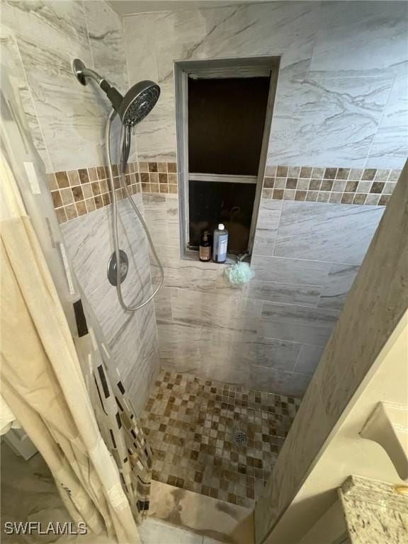 17133 Phlox Dr, Fort Myers, FL 33967 - full bath featuring tiled shower
