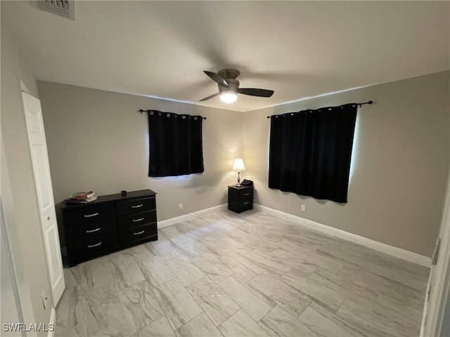 17133 Phlox Dr, Fort Myers, FL 33967 - unfurnished bedroom with a ceiling fan and baseboards