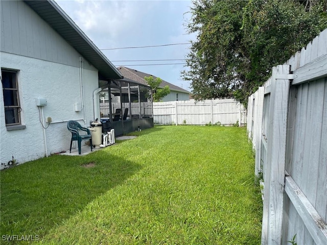 17133 Phlox Dr, Fort Myers, FL 33967 - view of yard featuring a sunroom