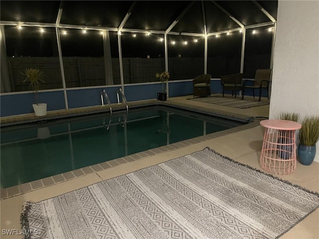 17133 Phlox Dr, Fort Myers, FL 33967 - swimming pool with glass enclosure, a patio area, and fence