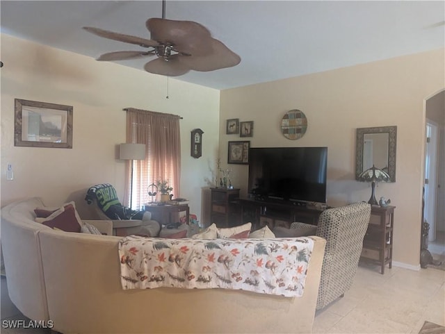1711 NW 28th Ter, Cape Coral, FL 33993 - tiled living room featuring a ceiling fan