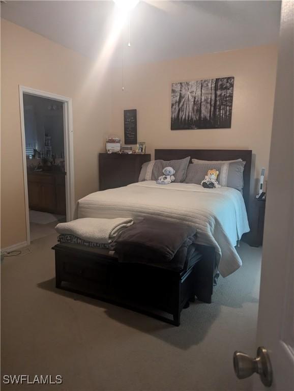 1711 NW 28th Ter, Cape Coral, FL 33993 - bedroom with carpet flooring and ensuite bathroom