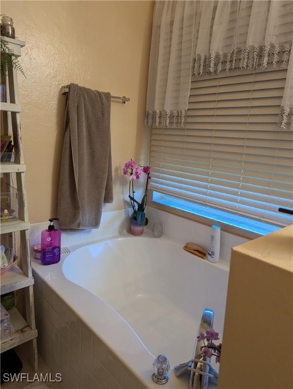 1711 NW 28th Ter, Cape Coral, FL 33993 - bathroom with a bath