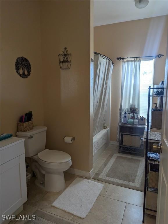 1711 NW 28th Ter, Cape Coral, FL 33993 - full bathroom featuring tile patterned flooring, vanity, and shower / bath combo