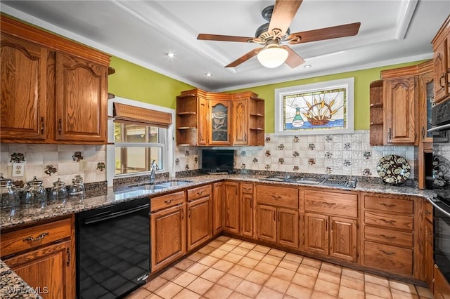 1263 Caloosa Dr, Fort Myers, FL 33901 - kitchen with dishwasher, open shelves, a sink, stovetop with downdraft, and brown cabinets
