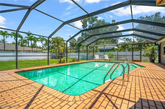1263 Caloosa Dr, Fort Myers, FL 33901 - view of swimming pool with a fenced backyard, a patio, and glass enclosure