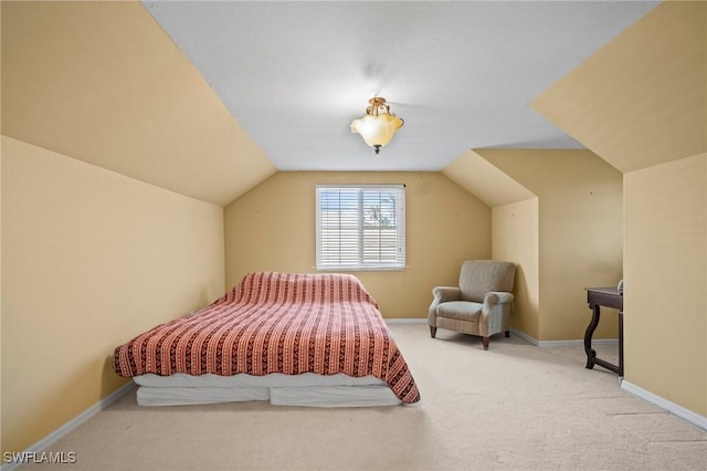 1263 Caloosa Dr, Fort Myers, FL 33901 - carpeted bedroom with lofted ceiling and baseboards