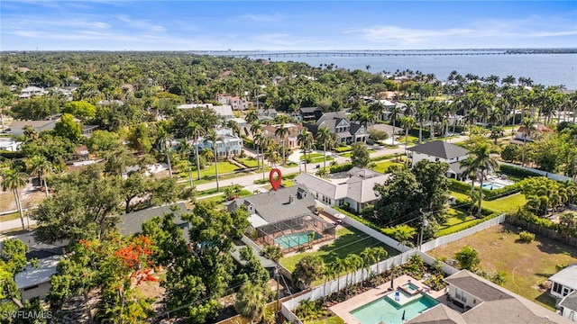 1263 Caloosa Dr, Fort Myers, FL 33901 - aerial perspective of suburban area featuring a pool and a large body of water