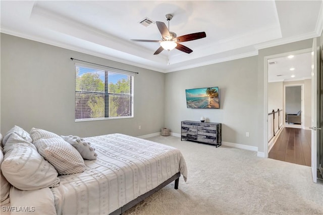 2102 Antigua Ln, Naples, FL 34120 - bedroom with a raised ceiling, ornamental molding, carpet, baseboards, and ceiling fan