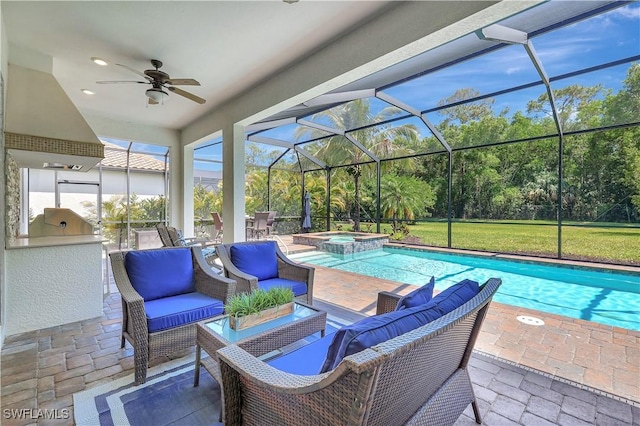 2102 Antigua Ln, Naples, FL 34120 - view of patio / terrace featuring an outdoor kitchen, ceiling fan, an outdoor living space, a pool with connected hot tub, and a lanai