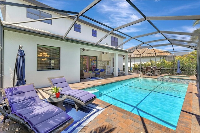 2102 Antigua Ln, Naples, FL 34120 - view of pool with an outdoor hangout area, a patio area, ceiling fan, and a pool with connected hot tub