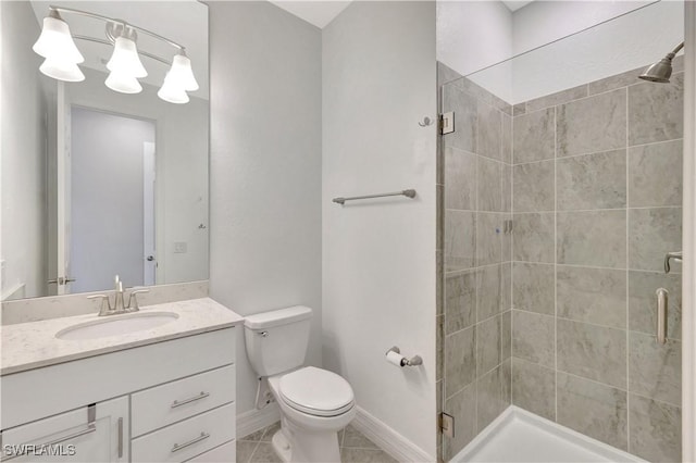 2102 Antigua Ln, Naples, FL 34120 - full bath featuring a stall shower, toilet, vanity, tile patterned floors, and baseboards