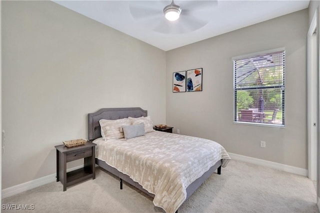 2102 Antigua Ln, Naples, FL 34120 - bedroom with carpet flooring, baseboards, and a ceiling fan