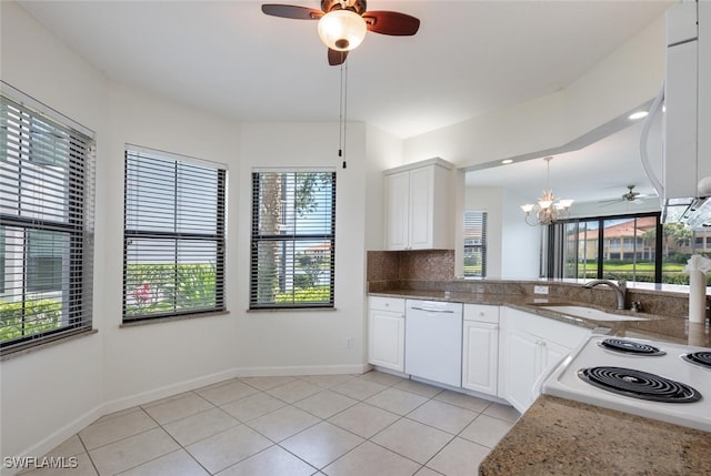 kitchen featuring white appliances, ceiling fan, a sink, and light tile patterned flooring