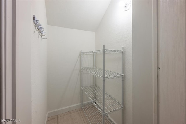 spacious closet featuring tile patterned floors