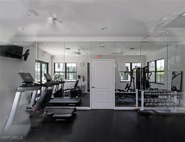 exercise room with healthy amount of natural light, crown molding, ceiling fan, and recessed lighting