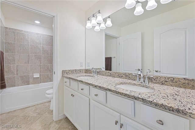 11937 Silver Cobblestone Way, Fort Myers, FL 33913 - full bath with double vanity, toilet, tile patterned floors, shower / tub combination, and a chandelier
