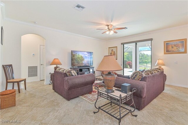 11937 Silver Cobblestone Way, Fort Myers, FL 33913 - living area featuring arched walkways, ornamental molding, a ceiling fan, and baseboards