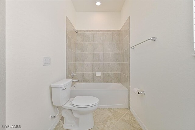 11937 Silver Cobblestone Way, Fort Myers, FL 33913 - full bath featuring toilet, baseboards, shower / bath combination, and tile patterned flooring