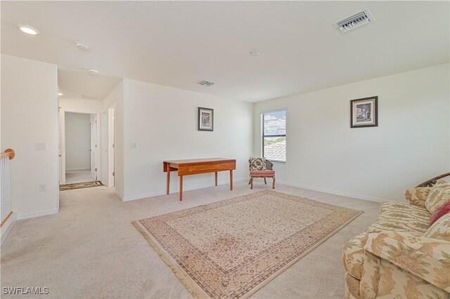 11937 Silver Cobblestone Way, Fort Myers, FL 33913 - living room with light carpet, baseboards, and recessed lighting