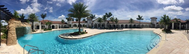 11937 Silver Cobblestone Way, Fort Myers, FL 33913 - community pool featuring a patio