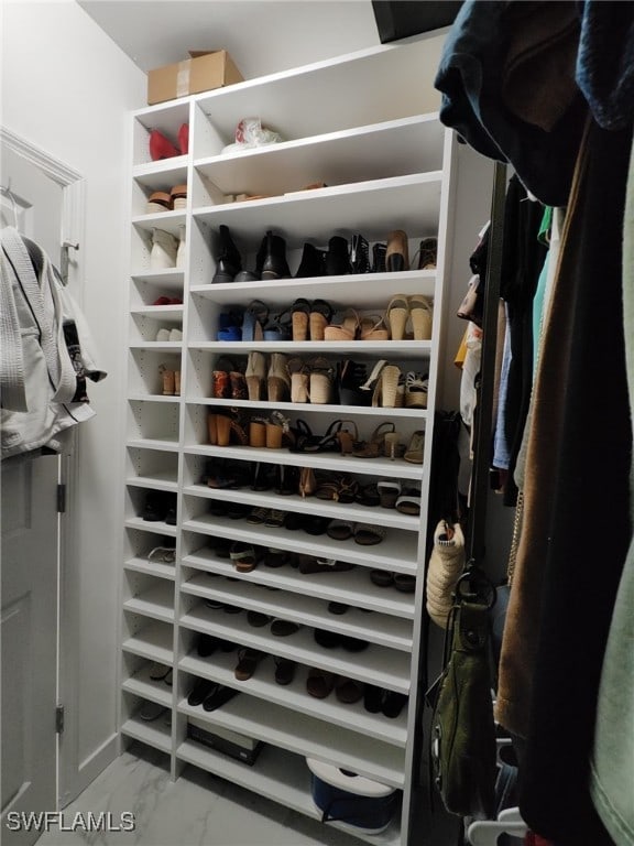 2709 SW 4th Pl, Cape Coral, FL 33914 - spacious closet with marble look tile flooring