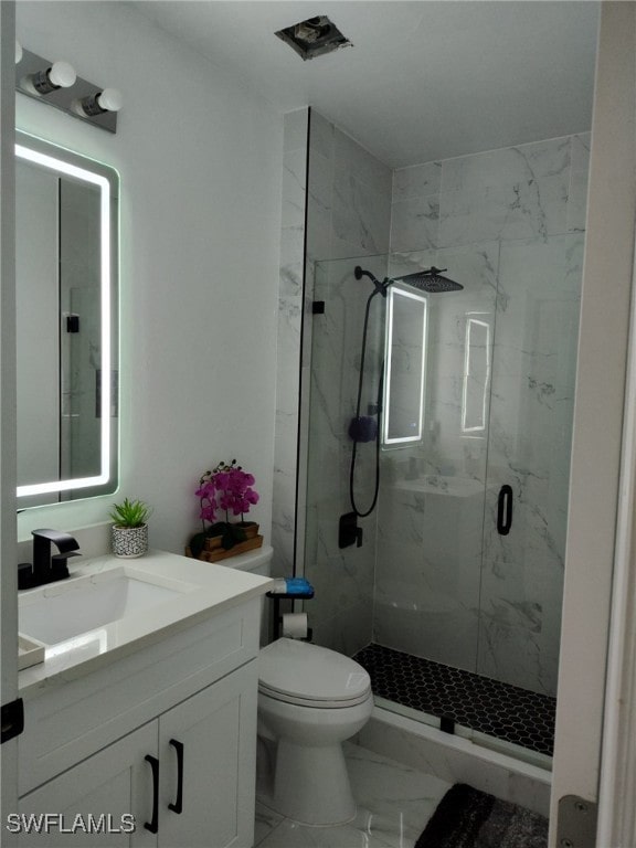 2709 SW 4th Pl, Cape Coral, FL 33914 - bathroom with marble finish flooring, vanity, a marble finish shower, and toilet
