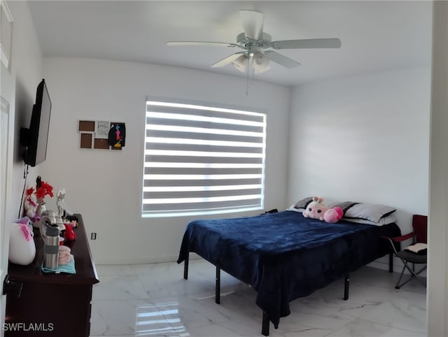 2709 SW 4th Pl, Cape Coral, FL 33914 - bedroom featuring marble finish flooring, multiple windows, and a ceiling fan