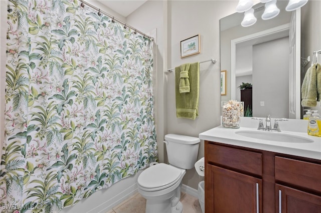 10947 Clarendon St, Fort Myers, FL 33913 - bathroom with toilet, vanity, baseboards, tile patterned flooring, and shower / tub combo