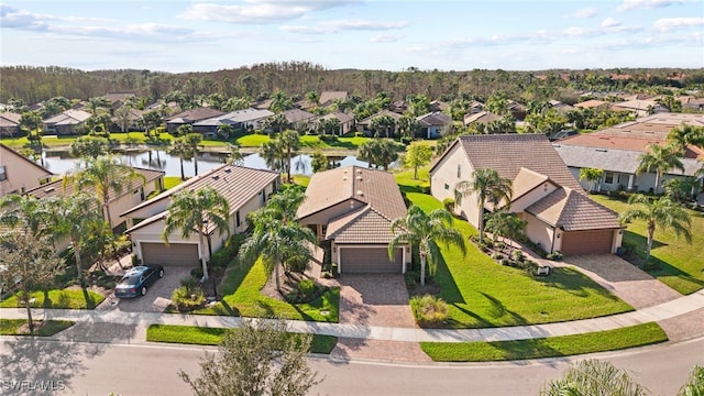 10947 Clarendon St, Fort Myers, FL 33913 - aerial perspective of suburban area featuring a nearby body of water