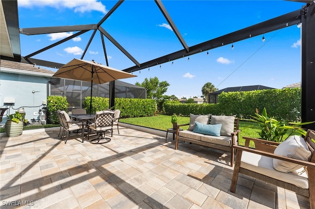 16523 Crescent Beach Way, Bonita Springs, FL 34135 - view of patio featuring a lanai, outdoor dining space, and an outdoor living space
