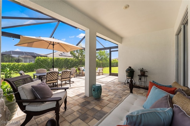 16523 Crescent Beach Way, Bonita Springs, FL 34135 - view of patio / terrace featuring outdoor lounge area, glass enclosure, and outdoor dining space