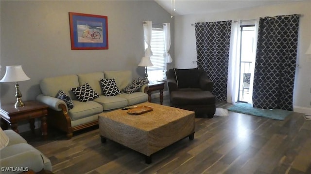 17156 Ravens Roost Unit 7, Fort Myers, FL 33908 - living room featuring wood finished floors and vaulted ceiling