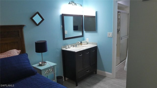 17156 Ravens Roost Unit 7, Fort Myers, FL 33908 - full bathroom with vanity, an enclosed shower, baseboards, and tile patterned flooring